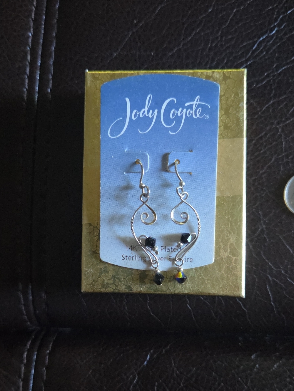 JODY COYOTE.                     Black Crystal Swirl               Drop Earrings